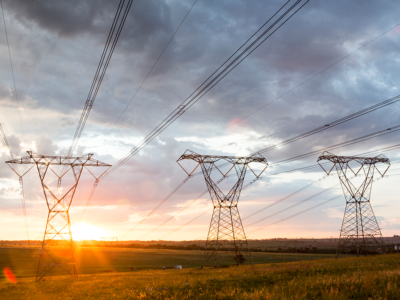 Large Power Lines Span Across the Land Keeping Electricity Prices Low