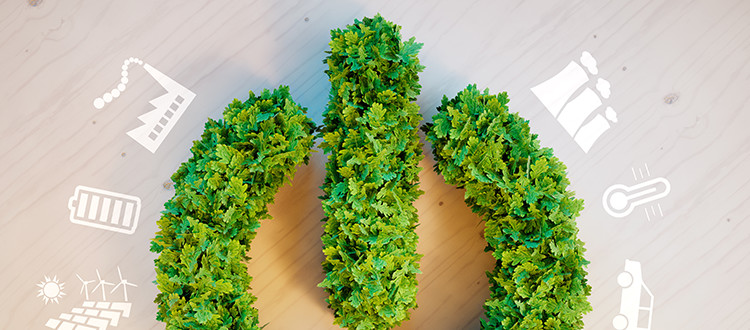 Green bushes in the shape of a power button